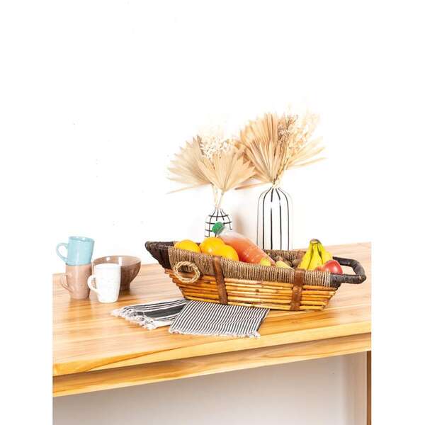 Image du produit Corbeille bateau en osier teinté, corde et bois.